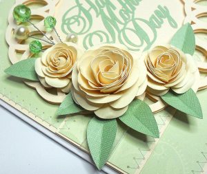 Completed card with a rolled flower design from Birds Cards