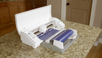 a silhouette cameo 3 with vinyl roll feeder
