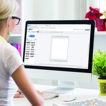 A woman uses Brother CanvasWorkspace on her Mac.