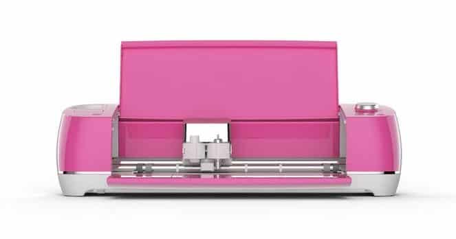 This bright pink Cricut Explore Air 2 opens to reveal the dual tool holder.