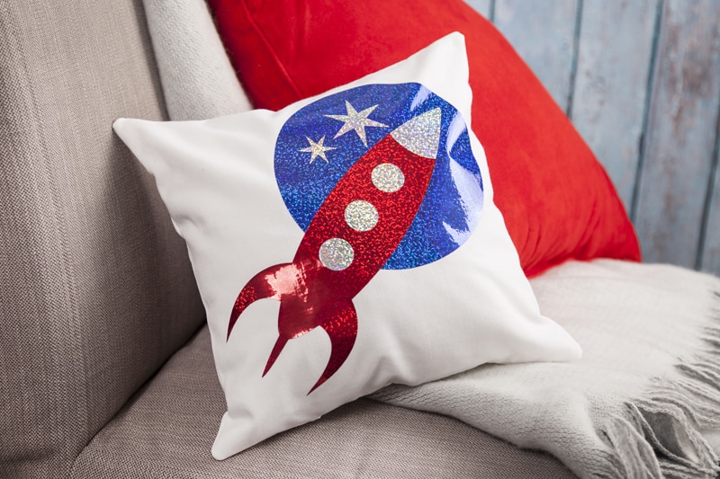 This rocket ship pillow was made with holographic iron-on.