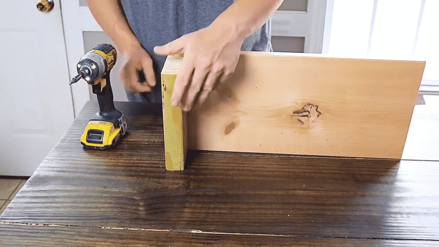 Attaching scrap 2x4 to the base