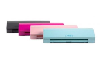 Four different colors of the Silhouette Cameo 3: slate gray, electric pink, blush pink, and aqua blue.