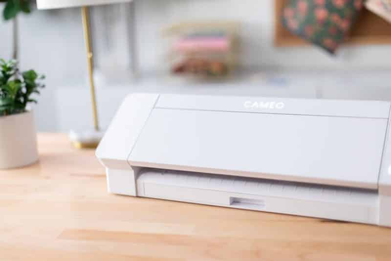 A Silhouette Cameo sitting on a table